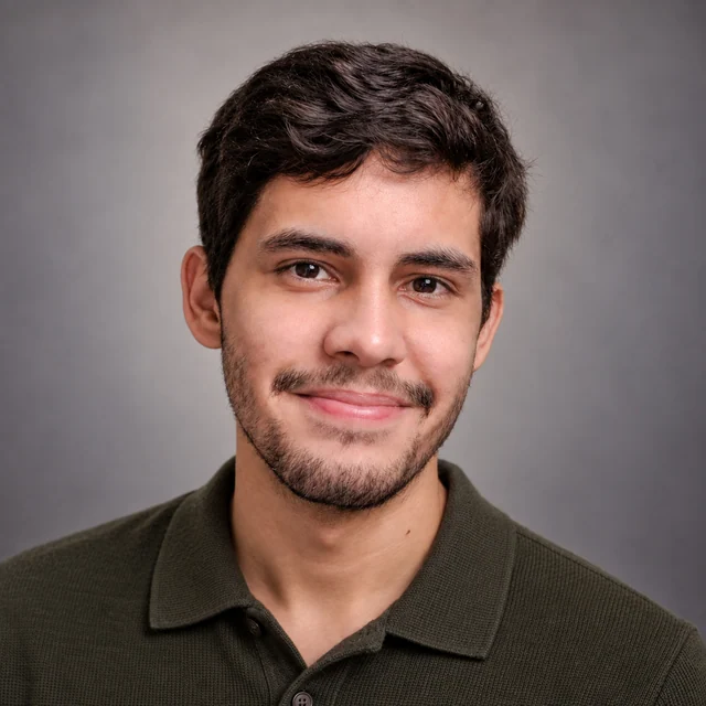Professional headshot generated from the Samsung phone photo, showing the man in a dark olive knit polo against a gray background.